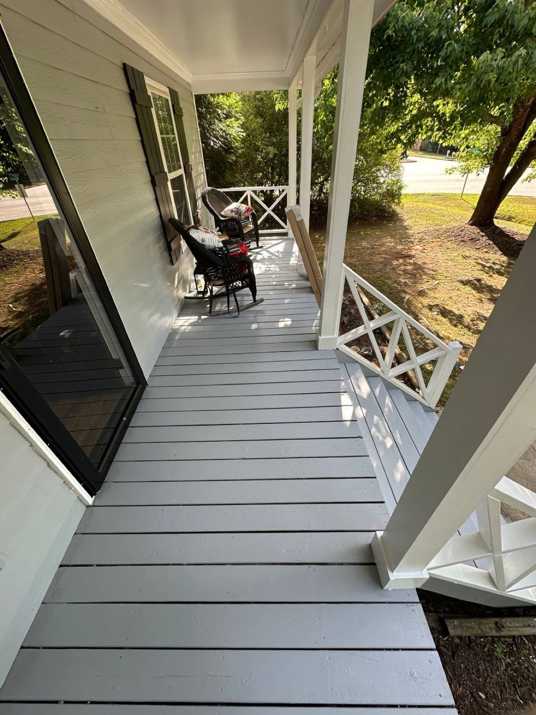Freshly painted porch floor and railings